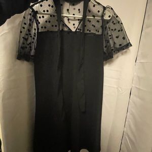 Black dress with mesh tops and tie-front detail